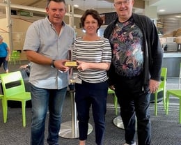 Susan Devoy presents Bruce with the winners Trophy, Mike Petrie arranges a re match and lessons from Susan !!